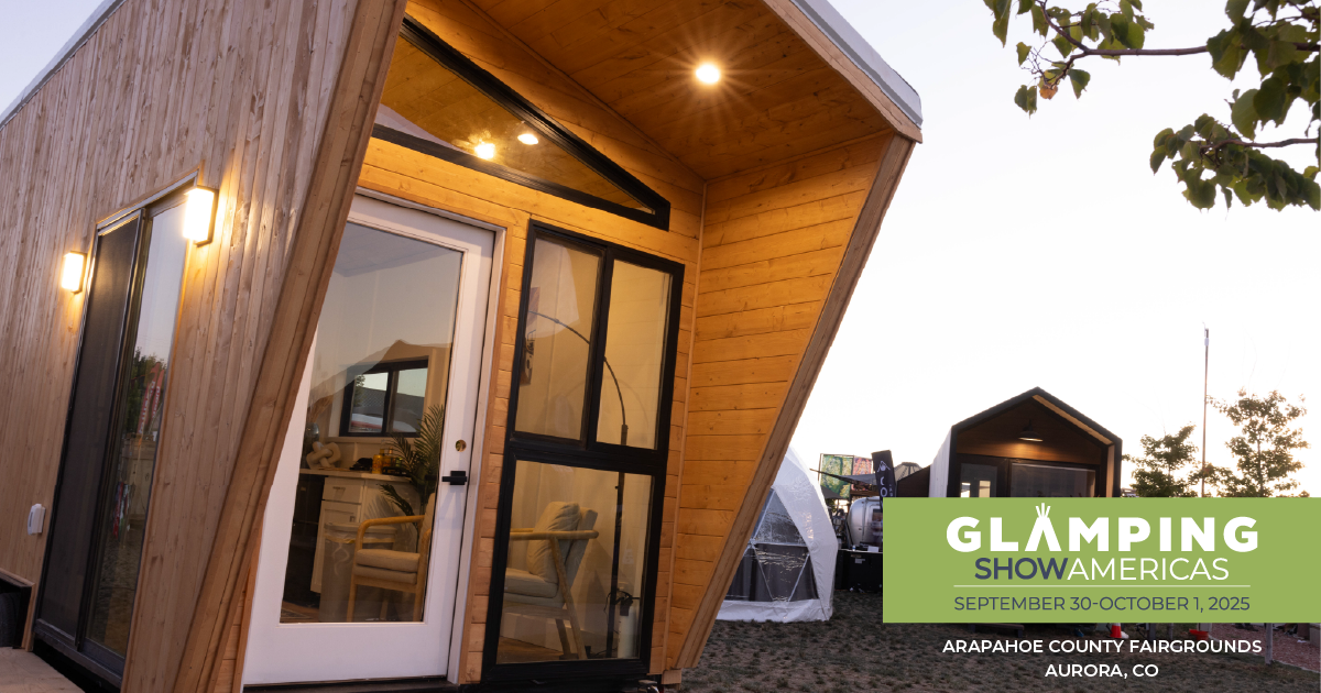 CS_1642_2025_GSA251_mktg Toolkit_Social Graphics_1200X630 Modern wooden glamping structure with large windows and a bright, inviting interior, showcased outdoors at sunset during Glamping Show Americas. Other unique glamping units are visible in the background, along with the event’s logo and details: “Glamping Show Americas, September 30–October 1, 2025, Arapahoe County Fairgrounds, Aurora, CO