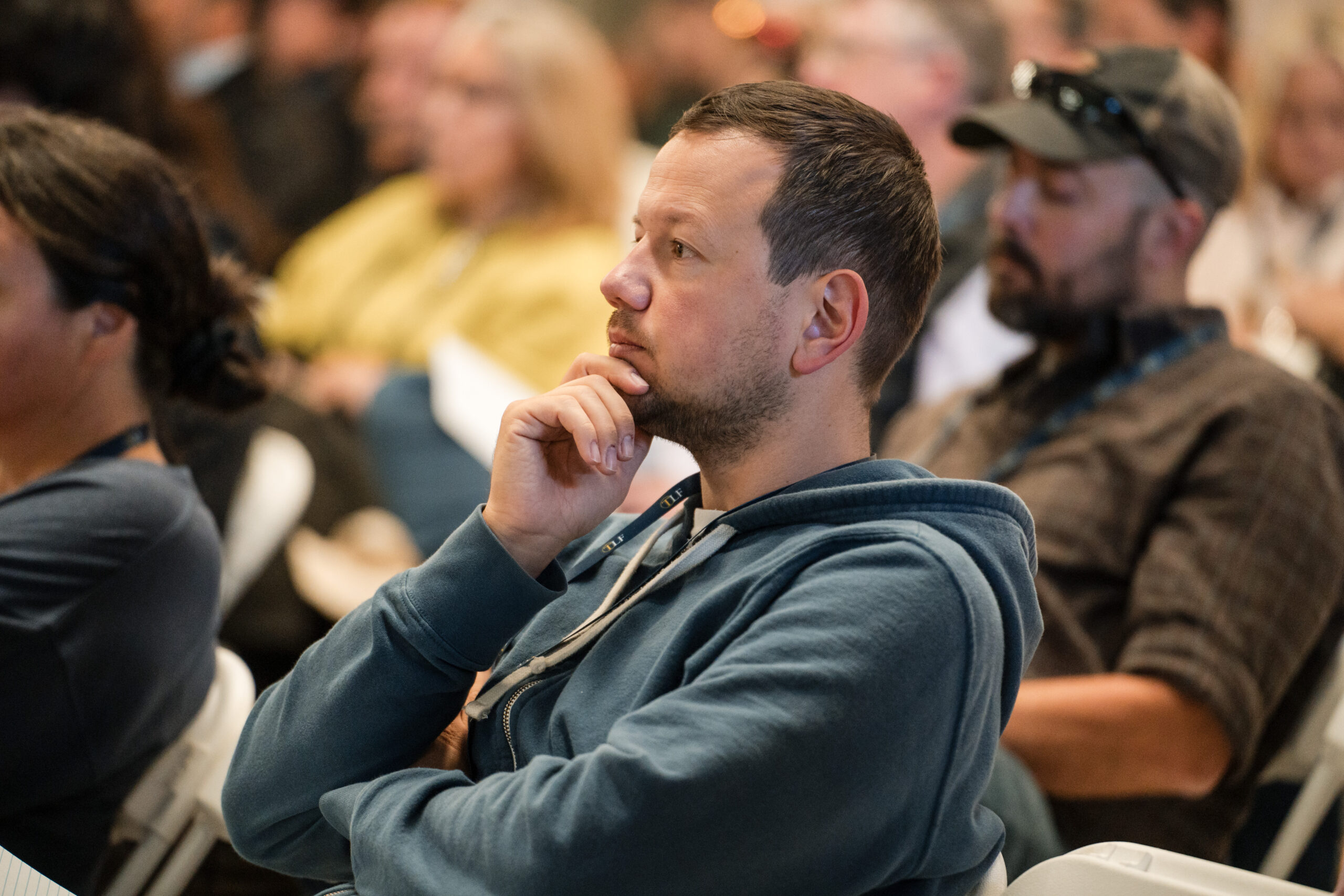 Glamping Show 2023 A Glamping Show Americas attendee is listening attentively to the conference session.