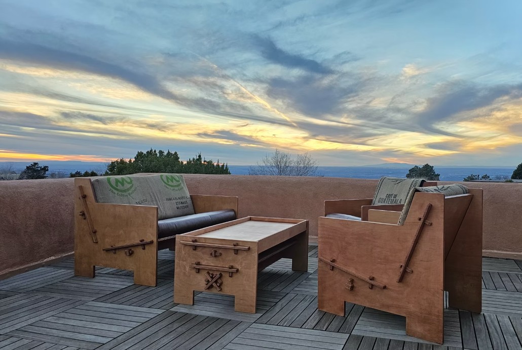 Gorgeous bsoke outdoor furniture from Mustang Home Goods against a dramatic sunset.