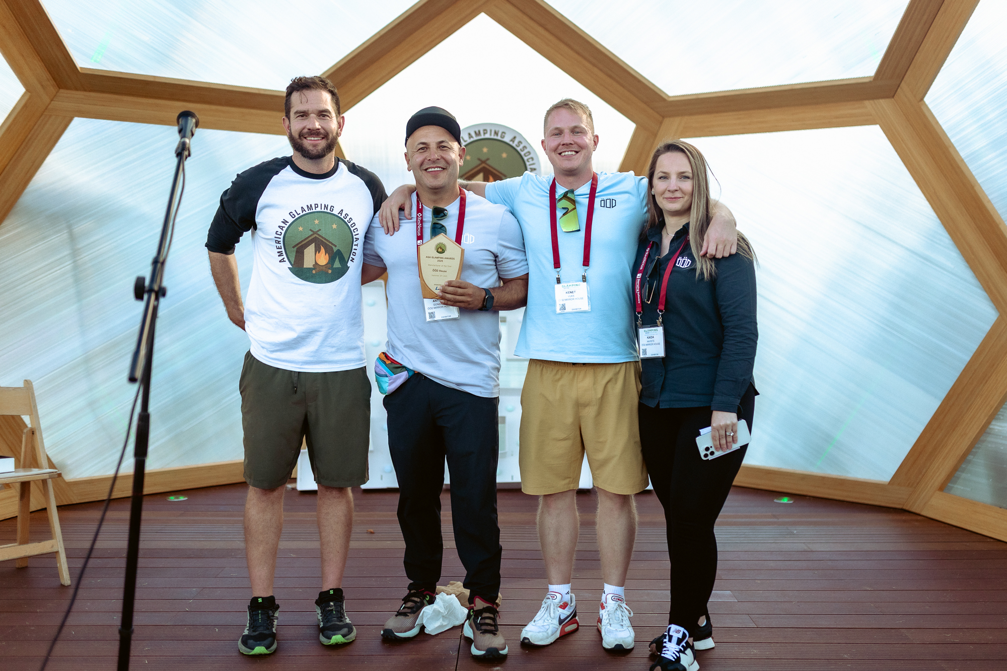 Ruben Martinez of the American Glamping Association poses with AGA Glamping Awards winners. 